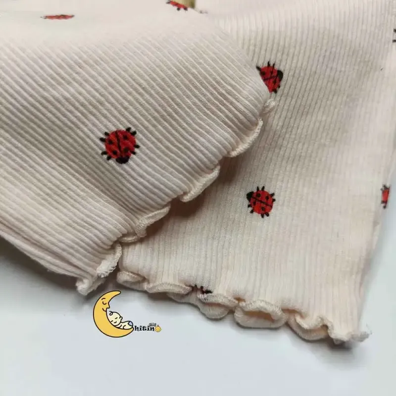بلوز دخترانه کبریتی طرح کفشدوزک برند next - تصویر 5