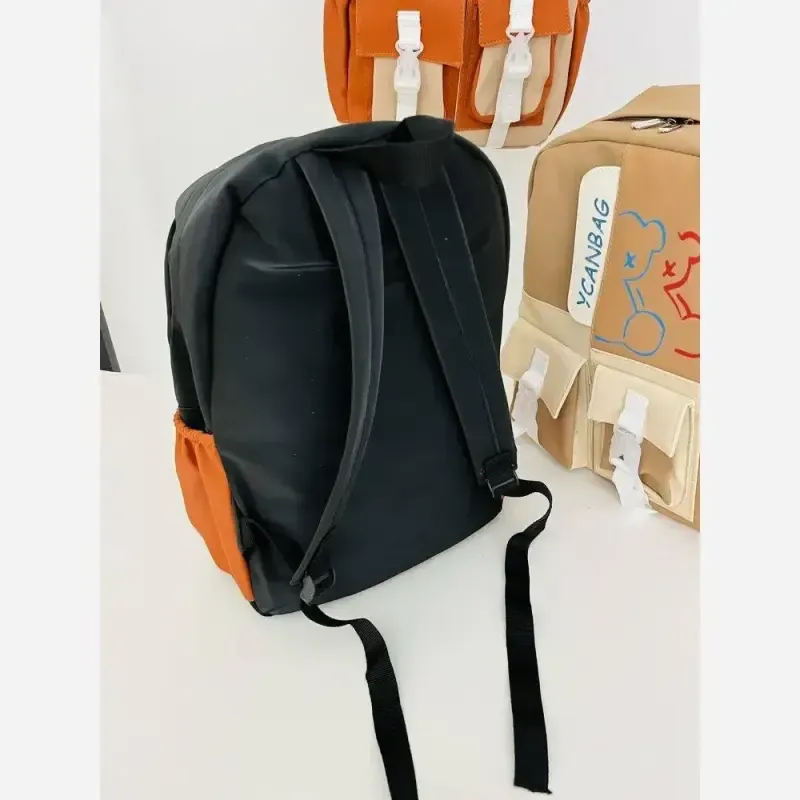 کوله پشتی فانتزی و جادار جنس نانسی رنگ مشکی عسلی نسکافه ابعاد 42 در 30 - تصویر 6