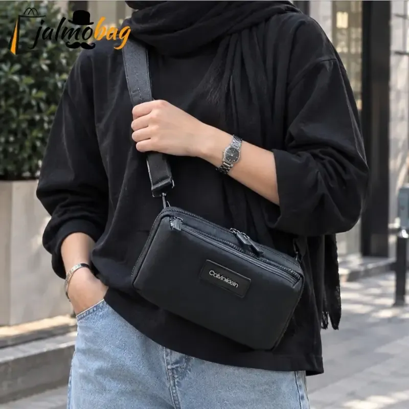 کیف دوشی دستی اسپرت کلوین کلاین پارچه برزنتی آب گریز سه کاره - تصویر 2